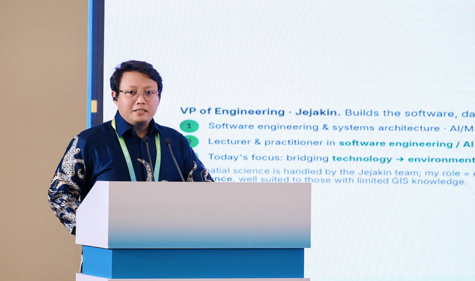 Hendri Karisma at the podium introducing his role and the focus of the session